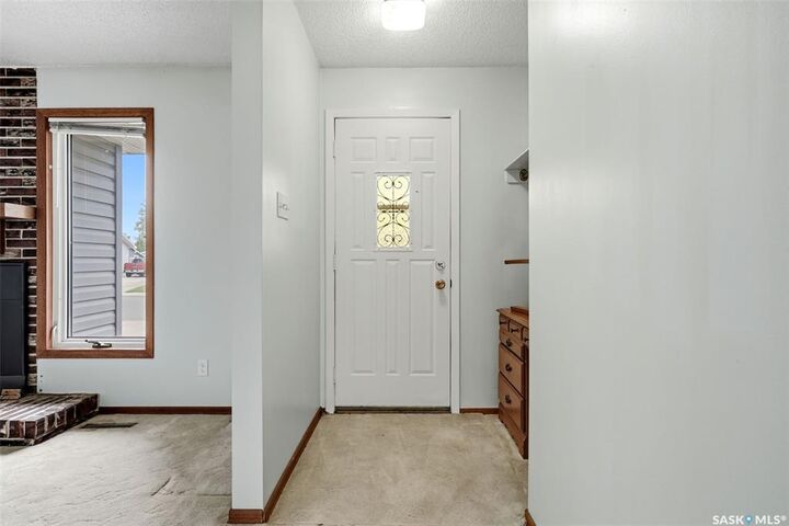 Property Photo:  65 McCaul Crescent  SK S4R 3X3 