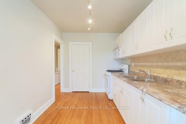 Property Photo: 1481 Queen Street E Upper ON M4L 1E2
