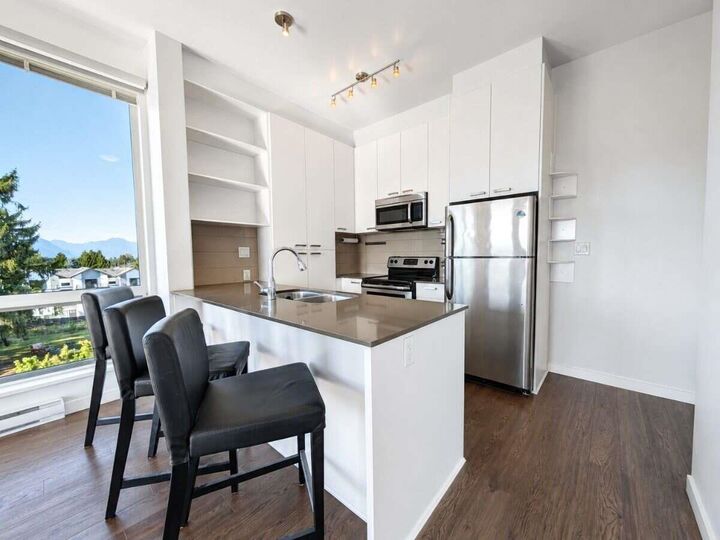 Property Photo: 20331 Dewdney Trunk Road 403 BC V2X 3C9