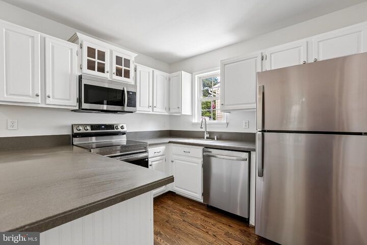 Property Photo:  7736 Woodlawn Avenue  MD 21122 