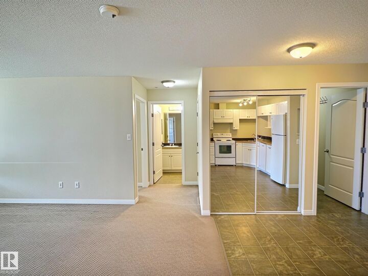 Property Photo: 5350 199 Street NW 111 AB T6M 0A4