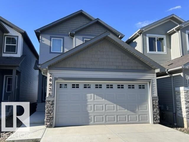 Property Photo:  20936 16 Avenue NW  AB T6M 3J4 
