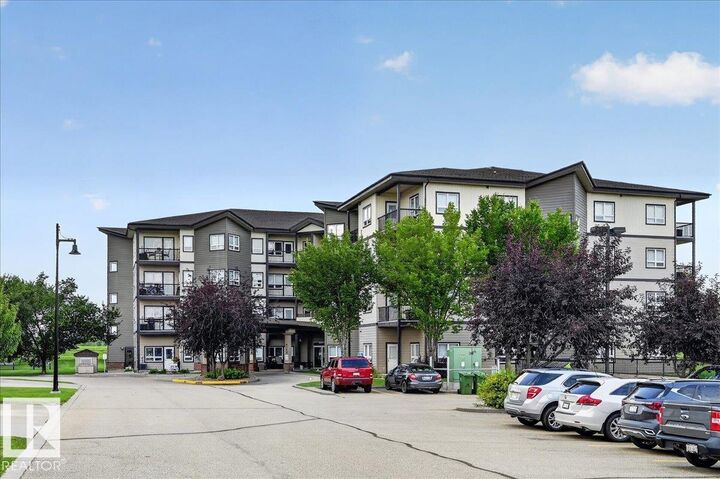 Property Photo: 8702 Southfort Drive 306 AB T8L 4R6