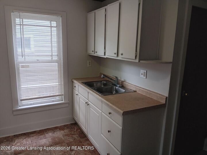 Property Photo:  908 N Pine Street  MI 48906 