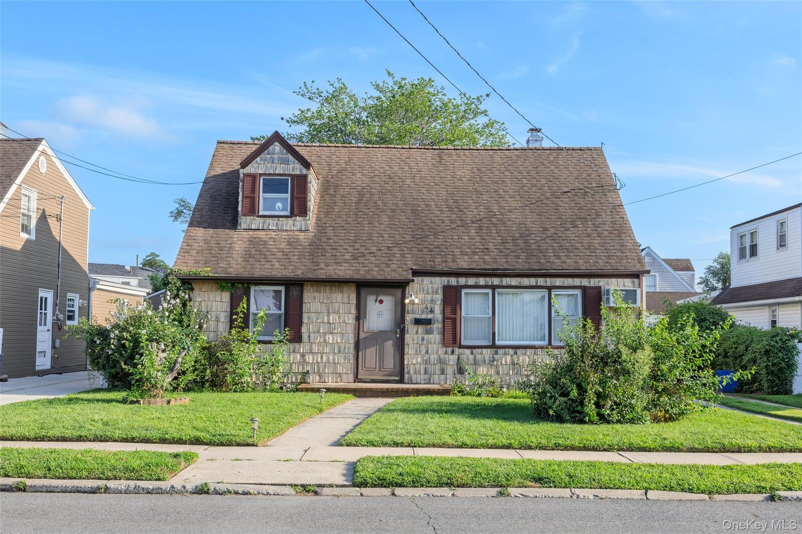 Property Photo: 44 Pine Lane NY 11581