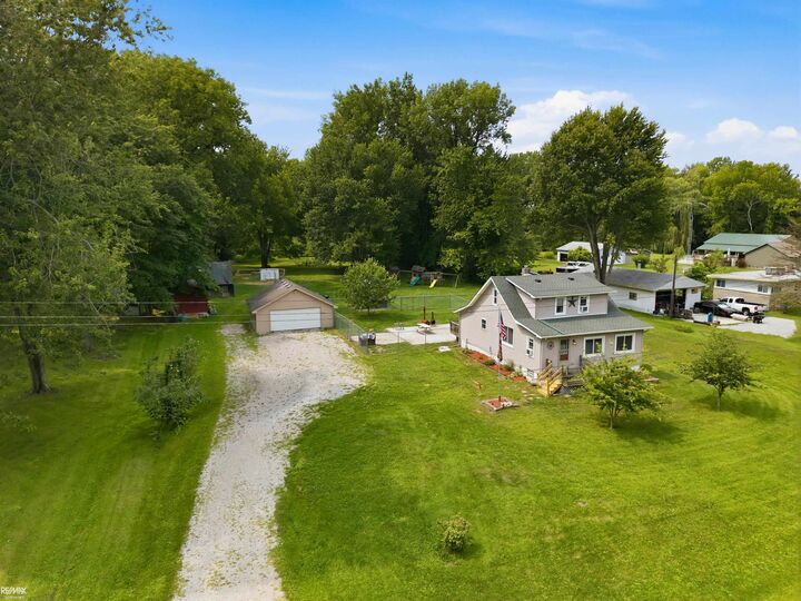 Property Photo: 8938 Marsh Road MI 48001-3912