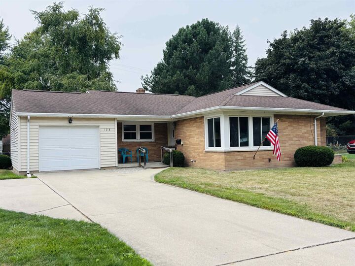 Property Photo:  128 Beyerlein Street  MI 48734 