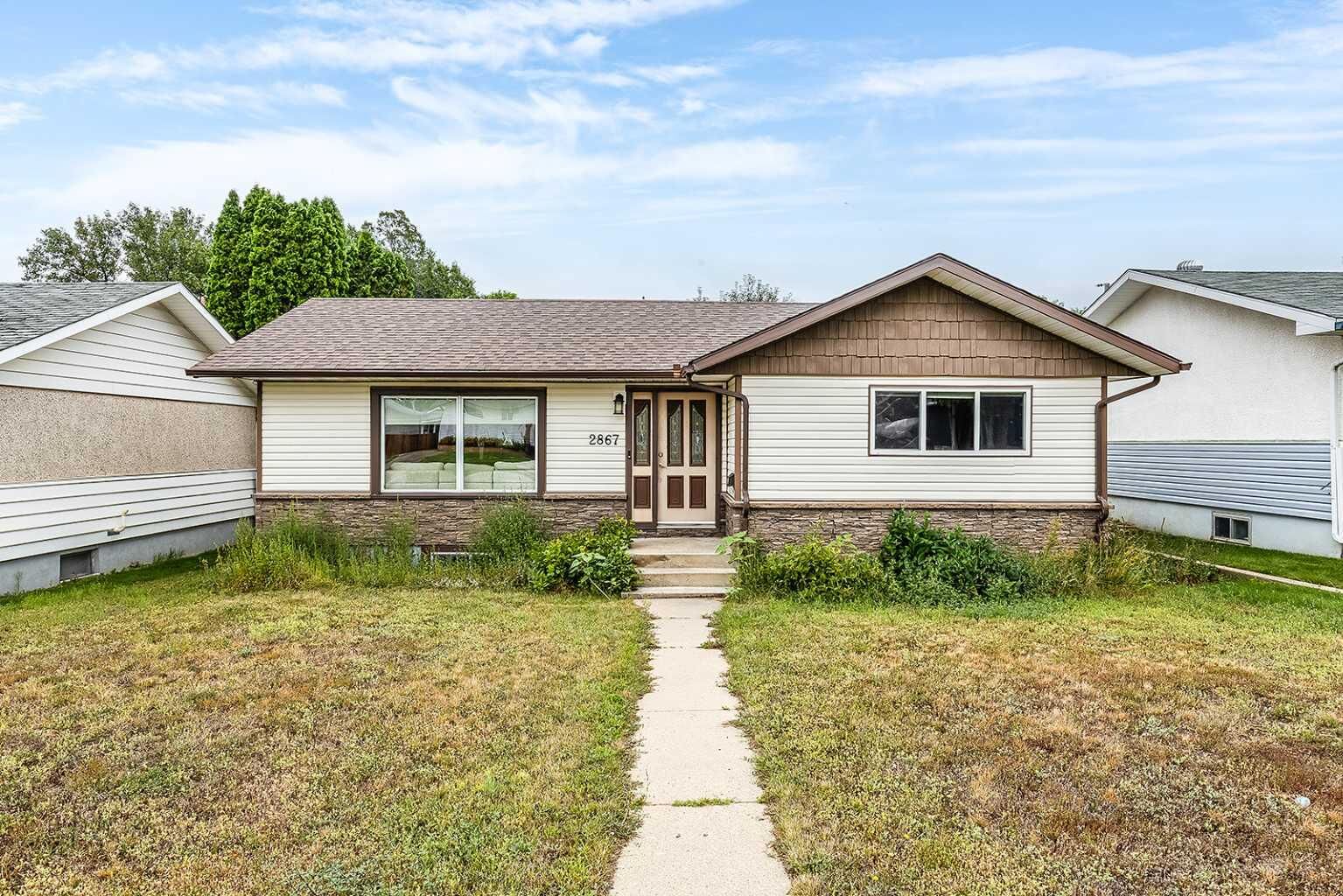 Property Photo:  2867 16 Ave SE  AB T1A 3T8 