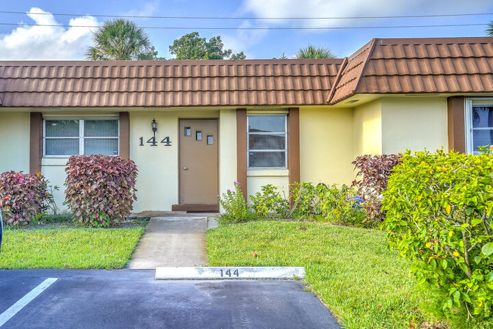 Property Photo:  5780 Fernley Drive W 144  FL 33415 