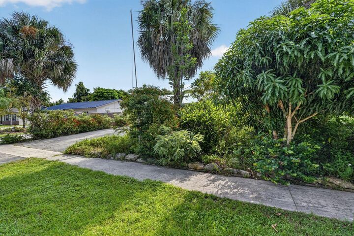 Property Photo:  303 S Delaware Boulevard  FL 33458 