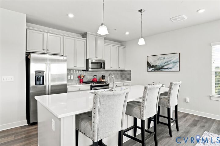 Property Photo:  3900 Maze Runner Drive 403  VA 23112 
