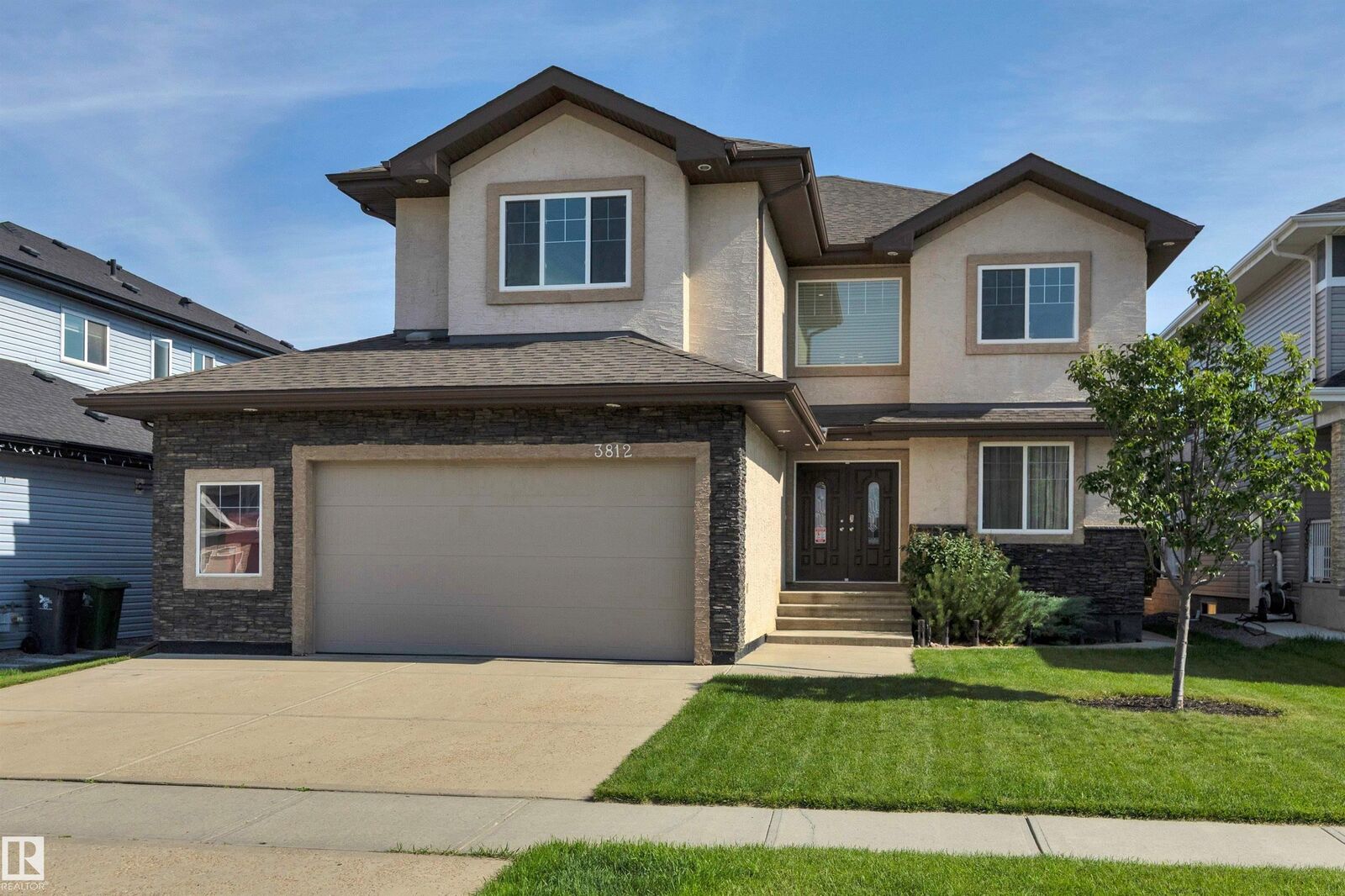 Property Photo:  3812 Triomphe Boulevard  AB T4X 0C4 
