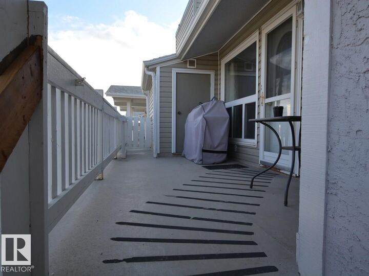 Property Photo:  2703 79 Street NW 10  AB T8A 3K4 