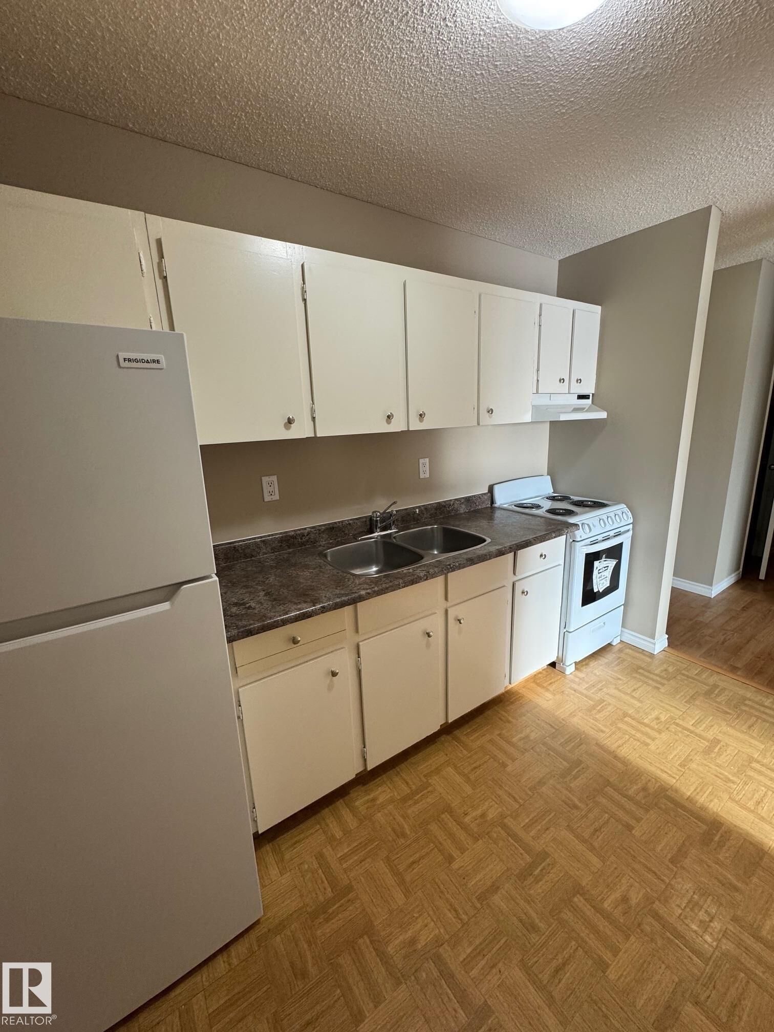 Property Photo:  7220 144 Avenue NW 315  AB T5C 3E4 