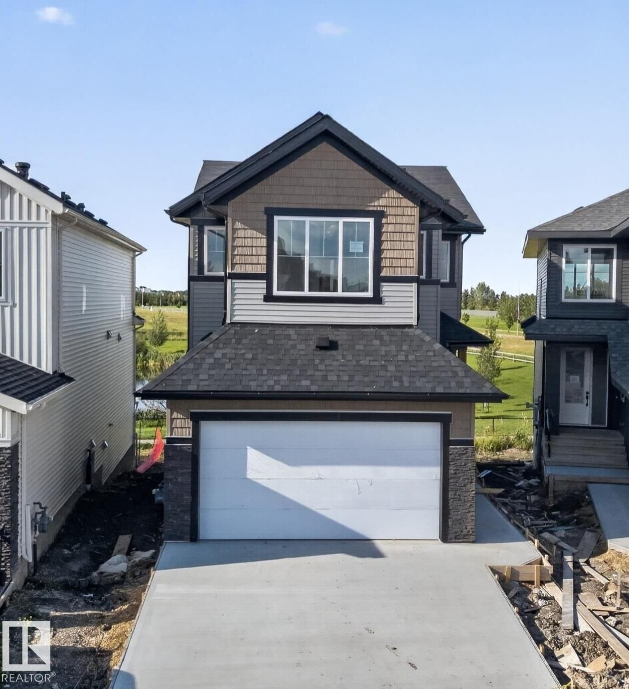 Property Photo: 182 Elliott Wynd AB T8L 1V1
