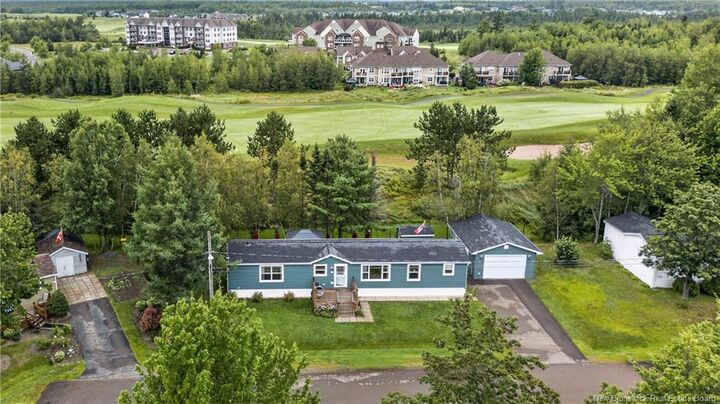 Property Photo:  20 Blue Jay  NB E1H 2S2 