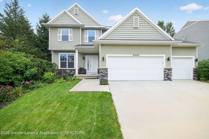 Property Photo:  6980 Abbey Lane  MI 48837 