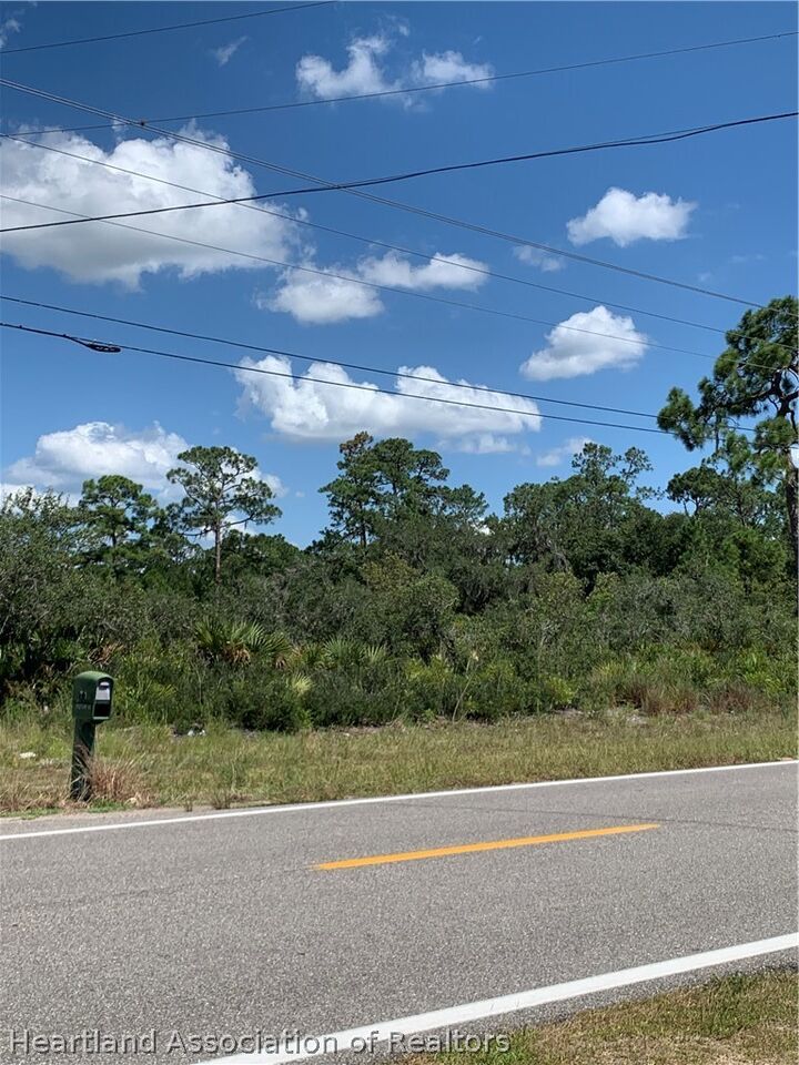 Property Photo: 10012 S Orange Blossom Boulevard FL 33875