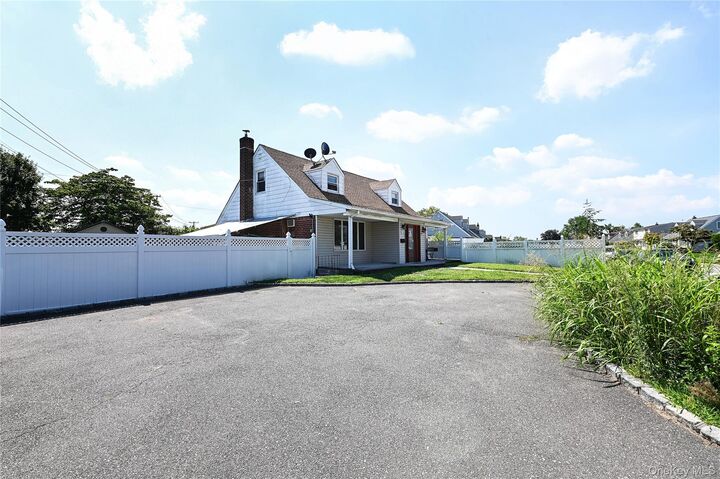 Property Photo: 1 Douglas Drive NY 11554