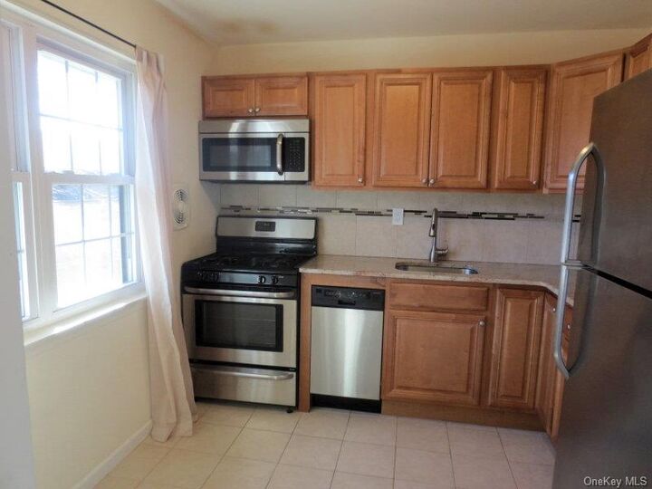 Property Photo:  106 Mariners Way  NY 11726 