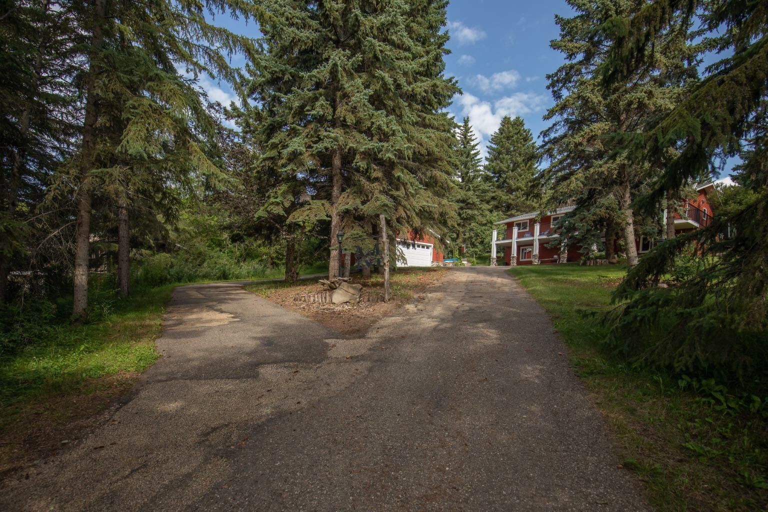 Property Photo:  26540 Highway 11 32  AB T4E 1A3 