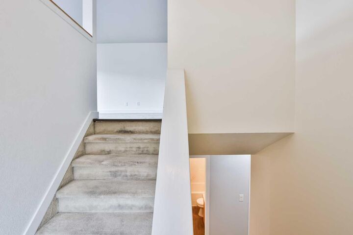 Property Photo: 304 Highlands Boulevard W 4 AB T1J 4X7