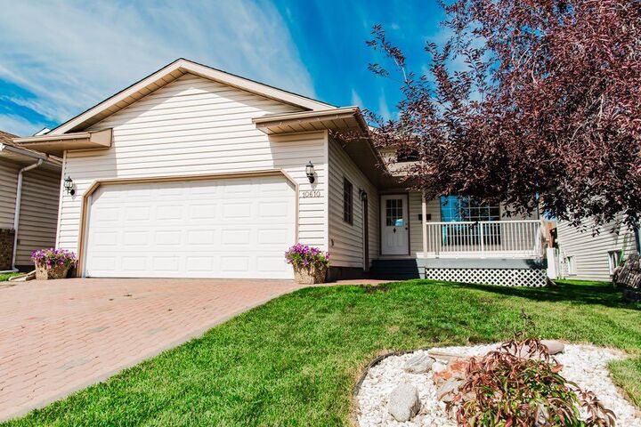 Property Photo:  10610 Michaelis Boulevard  AB T8W 2G9 