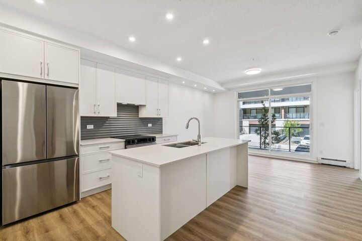Property Photo:  1808 Mahogany Boulevard SE 6107  AB T3M 4A5 
