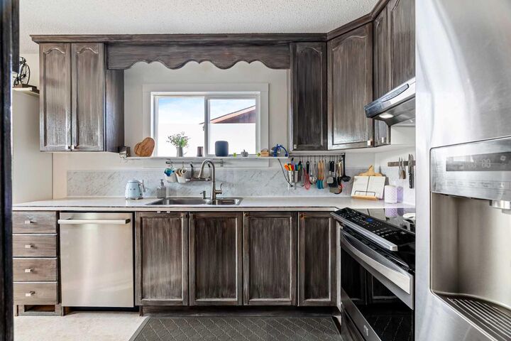 Property Photo:  128 Cornwall Drive  AB T9K 1B6 