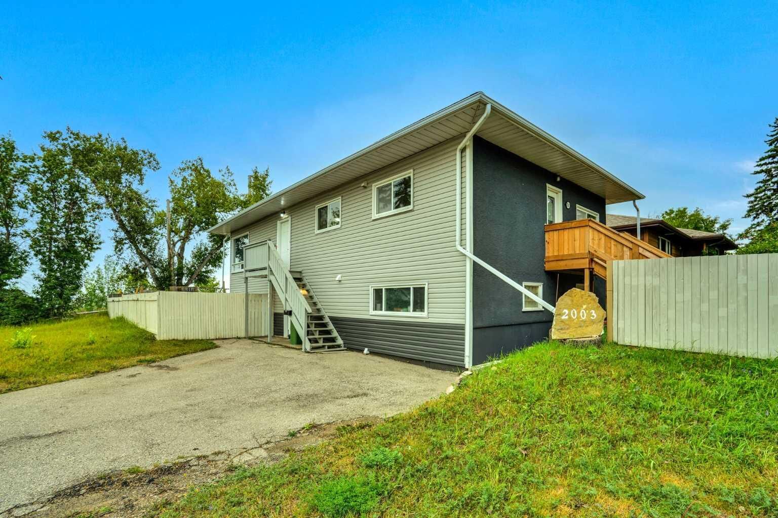 Property Photo:  2003 62 Avenue SE  AB T4C 0C2 