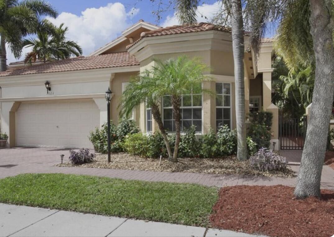 Property Photo:  5828 NW 121st Avenue  FL 33076 