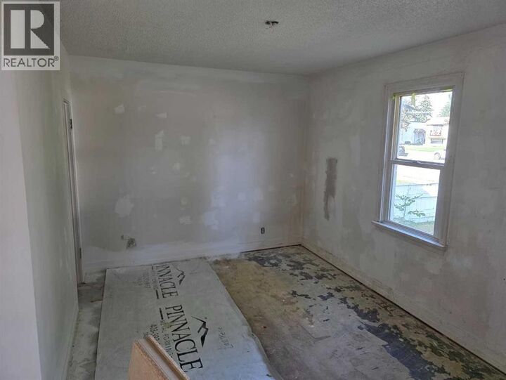 Property Photo: 5906 54 Street AB T1G 1K3