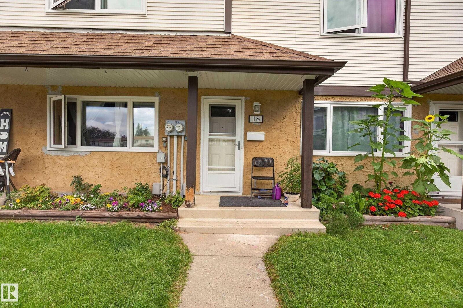 Property Photo: 14511 52 Street NW 18 AB T5A 4M6