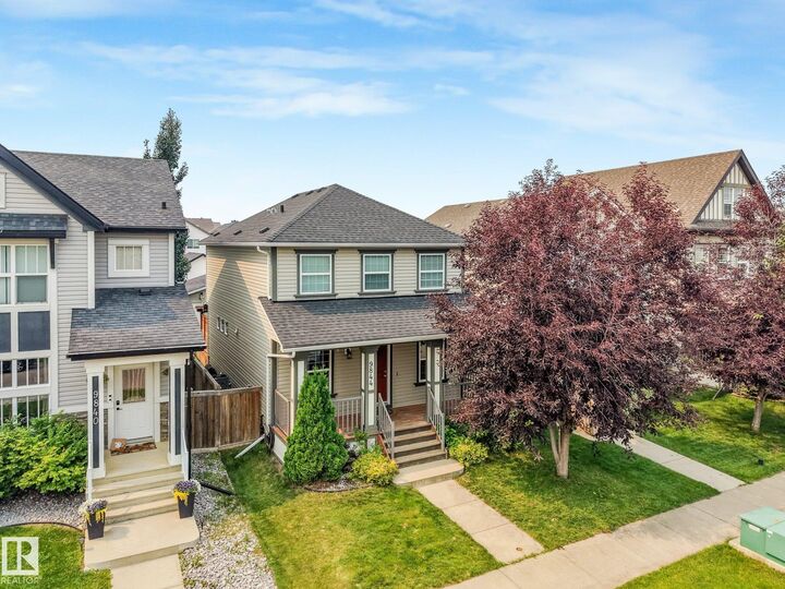 Property Photo:  9844 220 Street NW  AB T5T 4M3 