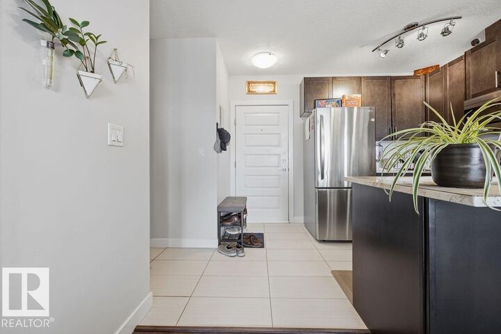 Property Photo: 5151 Windermere Boulevard SW 433 AB T6W 2K4