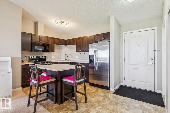 Property Photo:  7327 South Terwillegar Drive NW 7419  AB T6R 0L8 