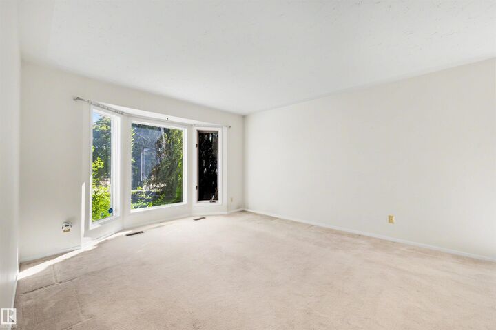 Property Photo: 4 Blue Quill Crescent NW AB T6J 6C2