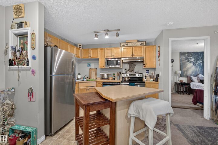 Property Photo: 245 Edwards Drive SW 221 AB T6X 1J9