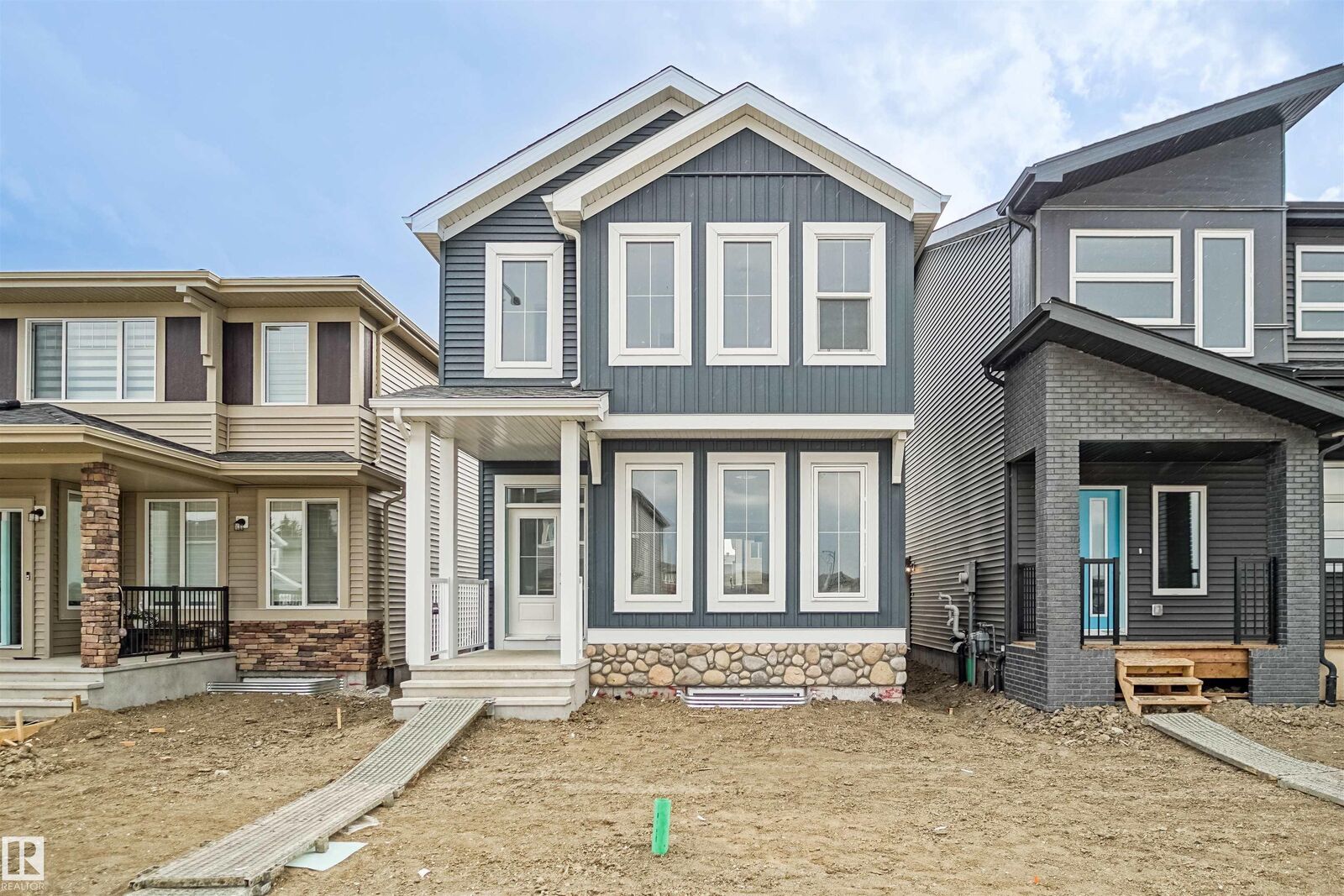 Property Photo:  21148 25 Avenue NW  AB T6M 2N6 