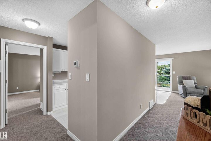 Property Photo:  9535 176 Street NW 212  AB T5T 6C8 