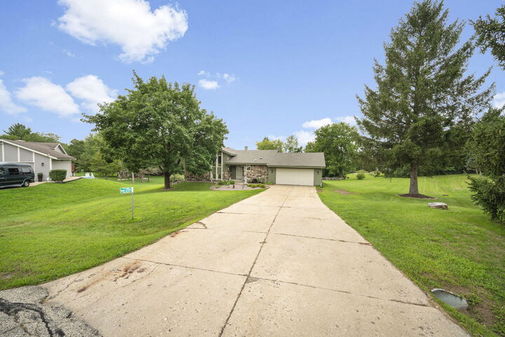 Property Photo:  W249s7055 Sugar Maple Dr  WI 53189 