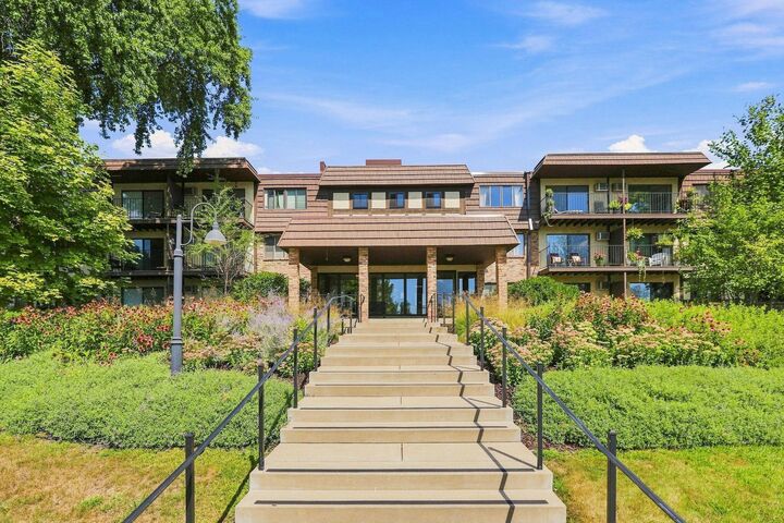Property Photo:  205 Barry Avenue S 103  MN 55391 