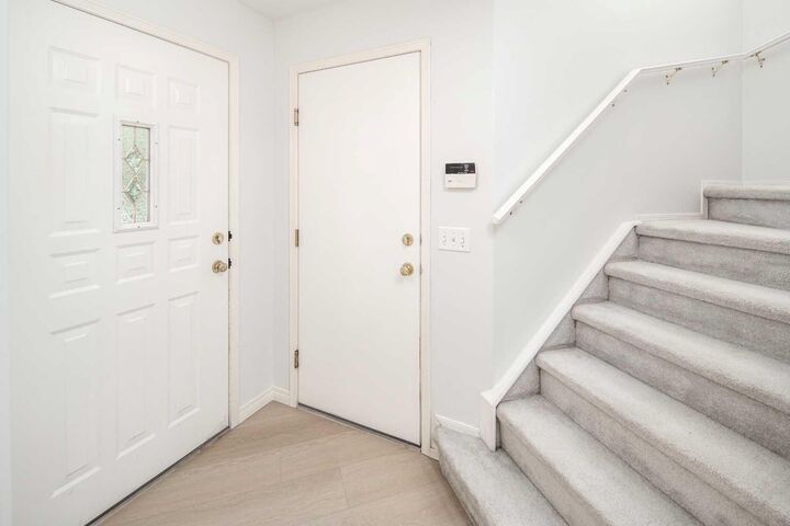 Property Photo: 859 Harvest Hills Drive NE AB T3K 4R4