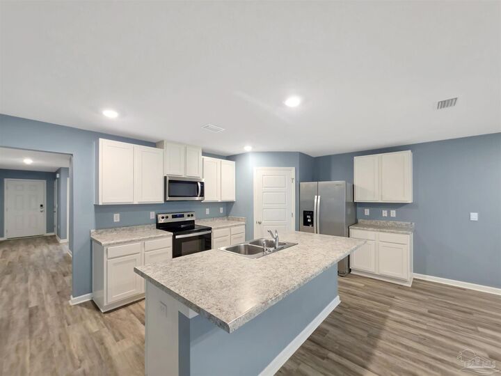 Property Photo:  6138 Native Dancer Way  FL 32526 