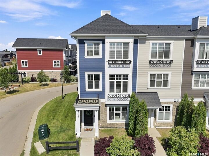 Property Photo: 703 Meadows Boulevard SK S7V 0L3