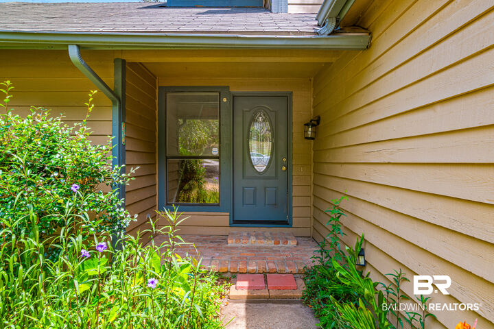 Property Photo: 36 Lake Shore Drive AL 36526