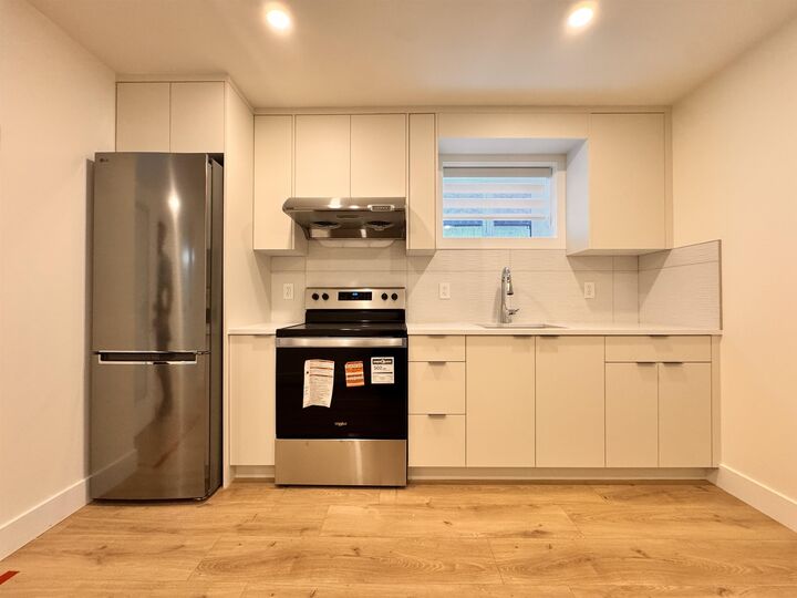 Property Photo:  8633 12 Avenue Bsmt 1  BC V3N 2M1 