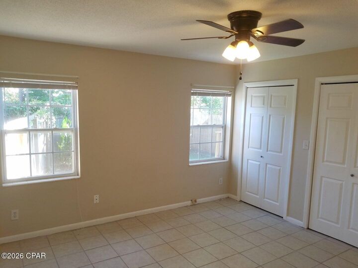 Property Photo:  7220 Poinciana Drive B  FL 32408 