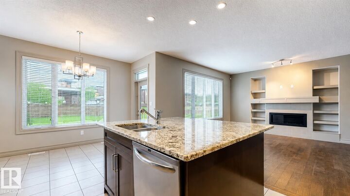 Property Photo:  885 Windermere Wynd NW  AB T6W 2M6 