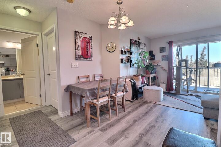 Property Photo:  14708 50 Street NW 416  AB T5A 5G9 